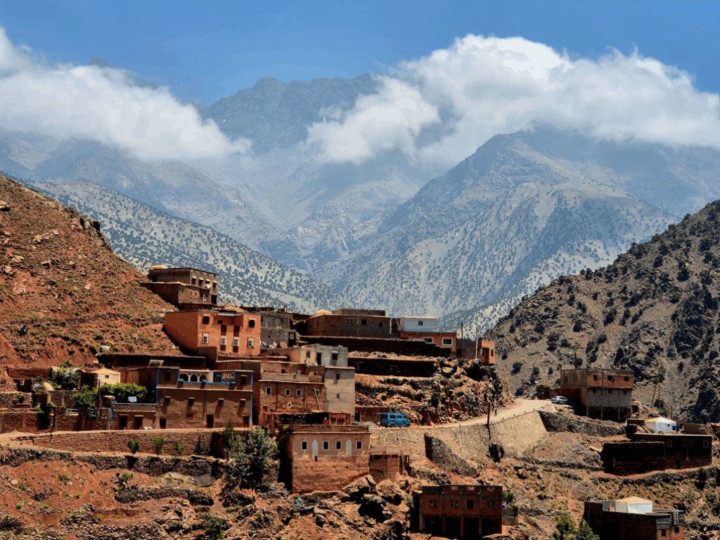 A cityscape with mountains in the background