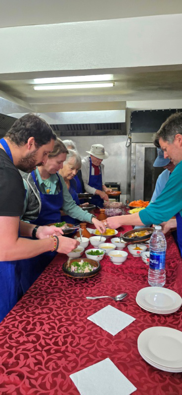 A group of tourists having a meal on luxury morocco tour