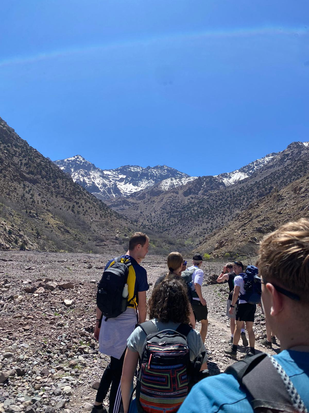 A group of tourists on a rocky trail