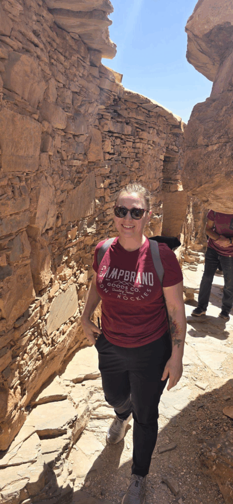 Tourists walking on a mountain pathway 