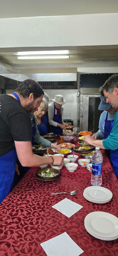 A group of tourists cooking Moroccan food 