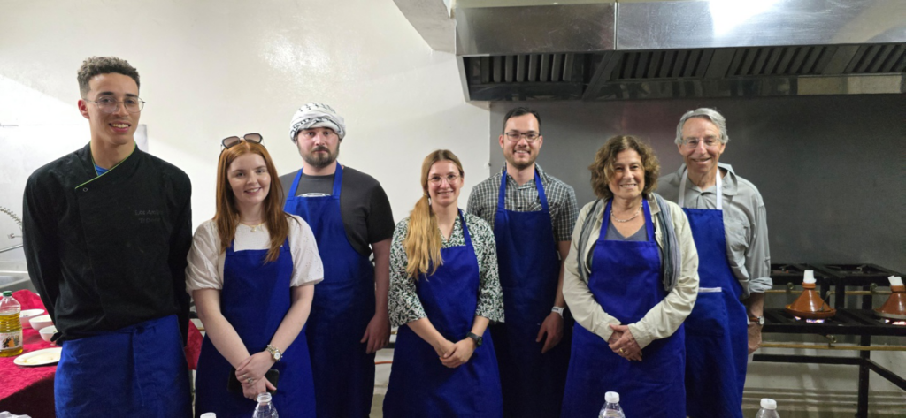 A group of tourists in a kitchen in Morocco