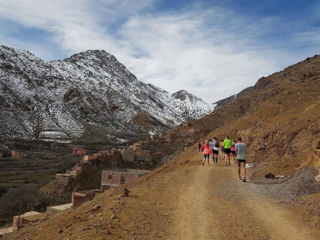 A group of hikers exploring the scenic trails of the Atlas Mountains.