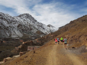 A group of hikers exploring the scenic trails of the Atlas Mountains.