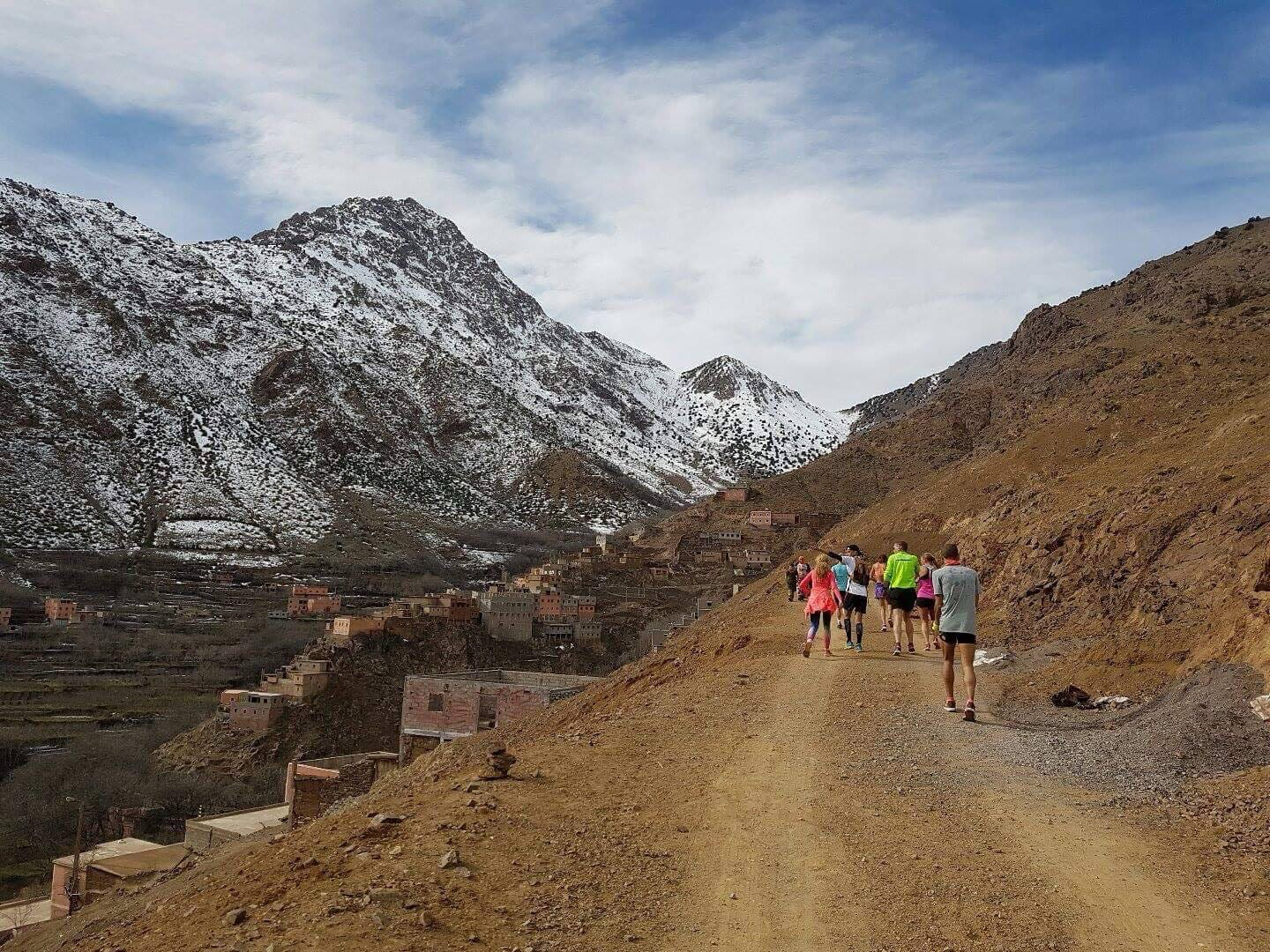 A group of hikers exploring the scenic trails of the Atlas Mountains.