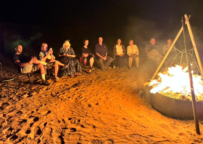 People sitting around a fire